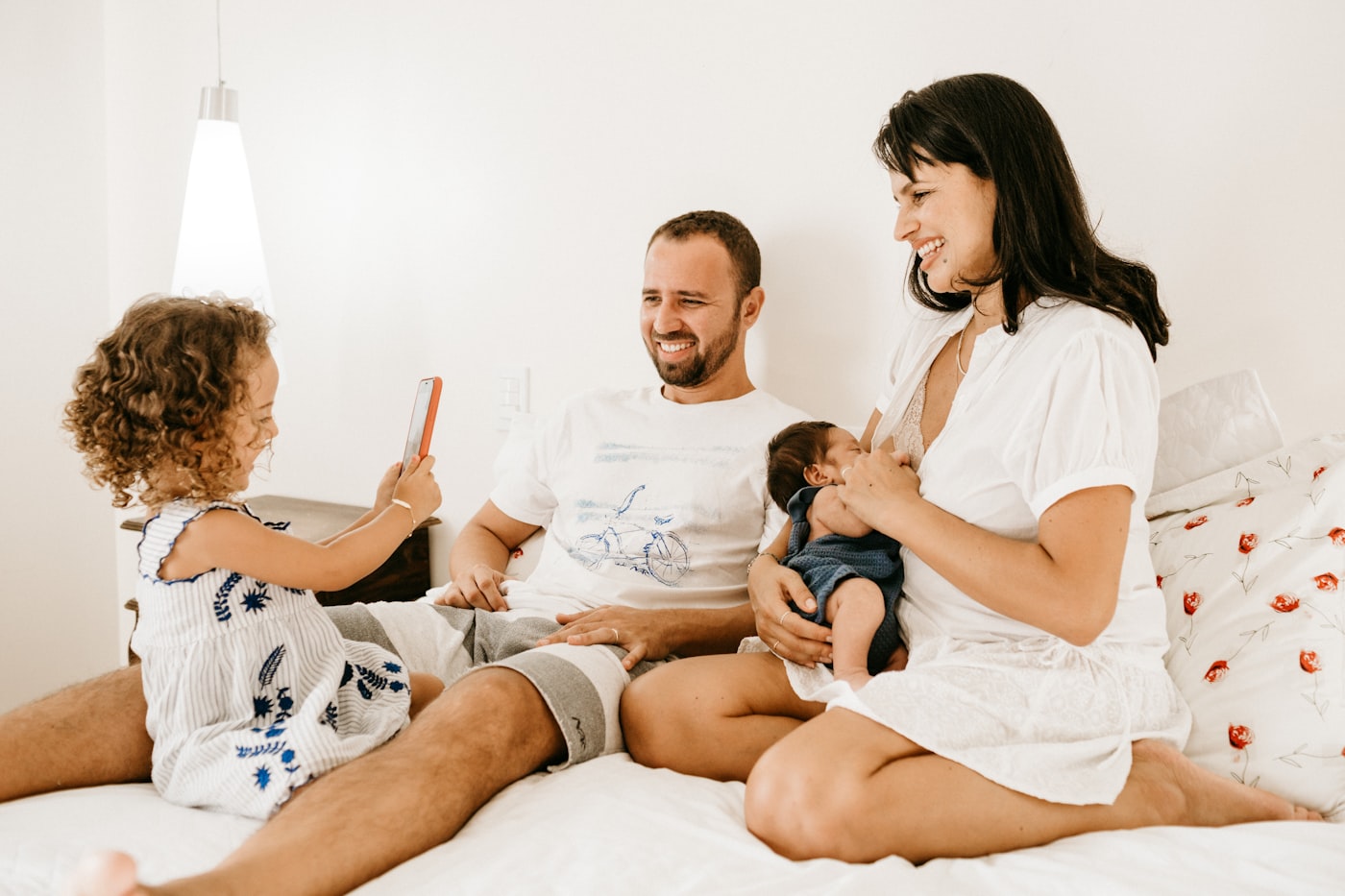 A family welcoming their newborn at home